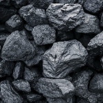 Close-up view of various pieces of graphite arranged together in a pile.