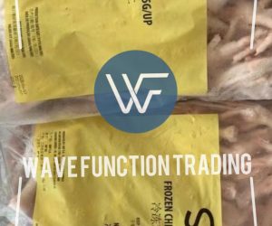 Two packages of frozen chicken feet with yellow labels displaying product information.